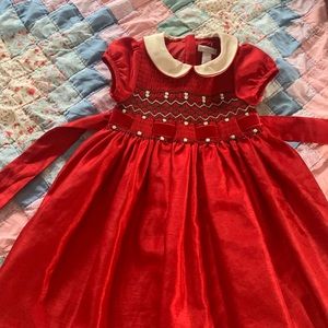 Super nice !  Gently used   Red smocked dress